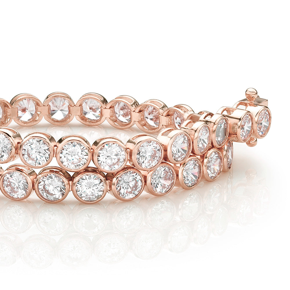 Round Brilliant tennis bracelet with 9.25 carats* of diamond simulants in 10 carat rose gold