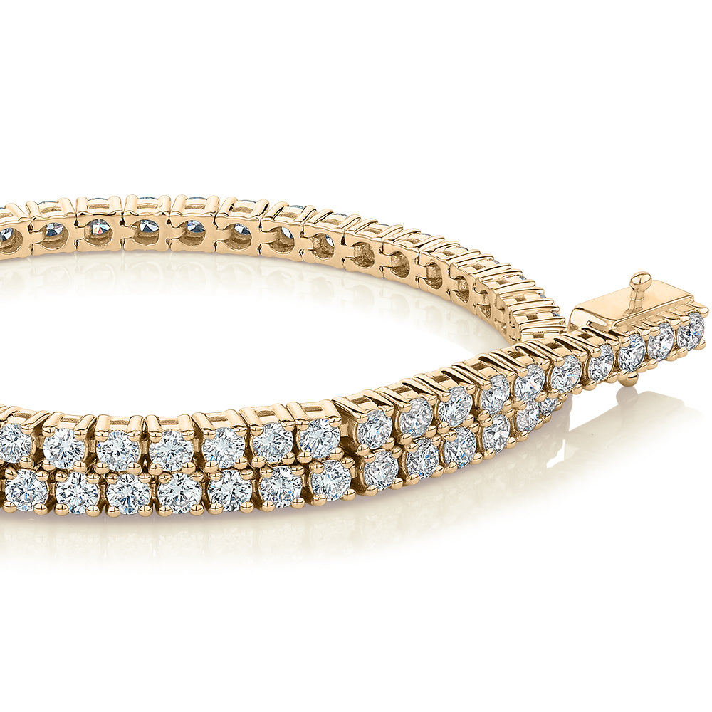 Signature Simulant Diamond 3 carat* TW round brilliant tennis bracelet in 10 carat yellow gold