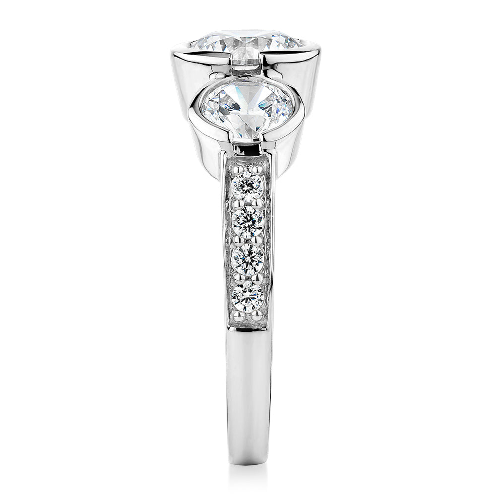 Three stone ring with 2.11 carats* of diamond simulants in 10 carat white gold