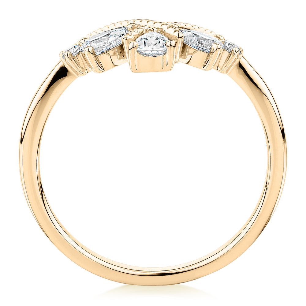 Pear curved wedding or eternity band with 0.66 carats* of diamond simulants in 10 carat yellow gold