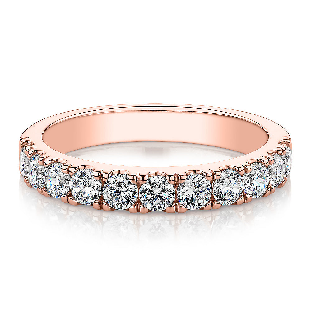 Wedding or eternity band with 0.88 carats* of diamond simulants in 14 carat rose gold