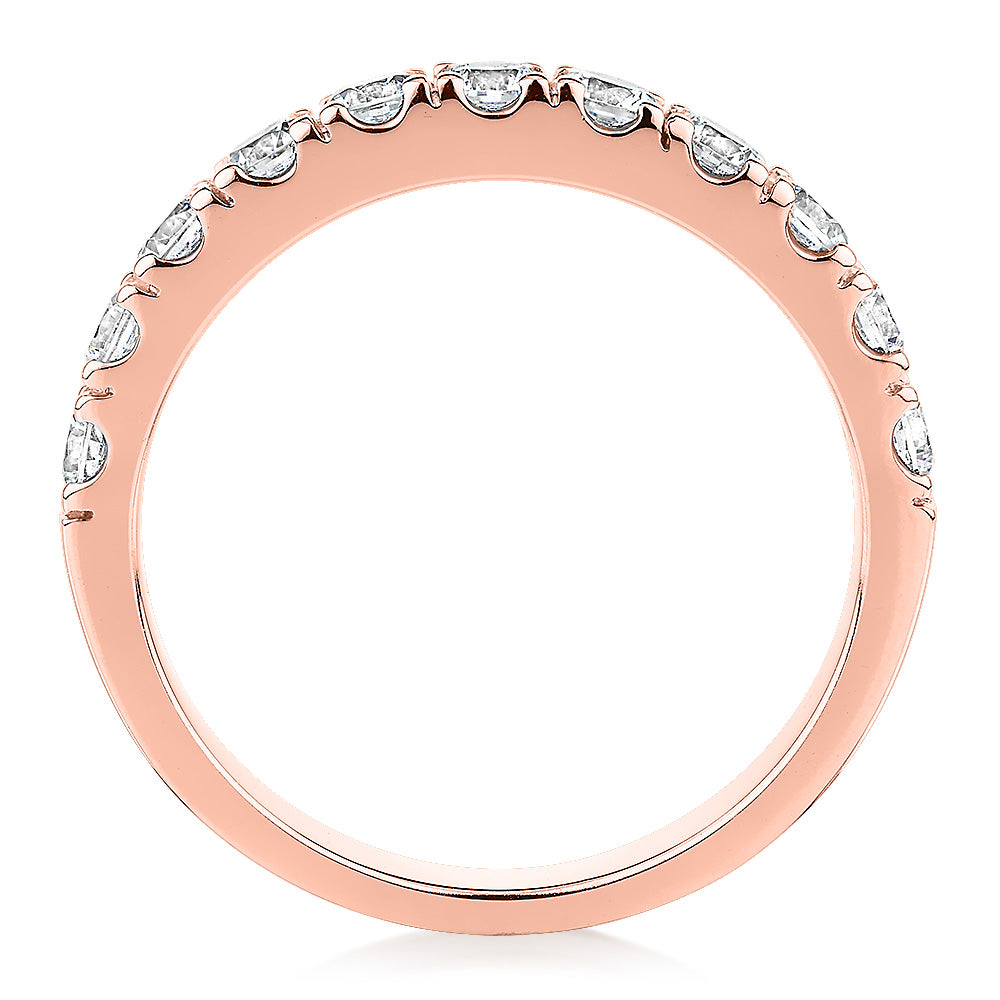 Wedding or eternity band with 0.88 carats* of diamond simulants in 14 carat rose gold