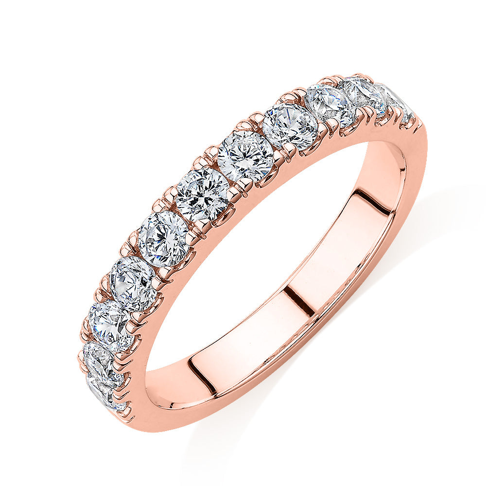 Wedding or eternity band with 0.88 carats* of diamond simulants in 14 carat rose gold