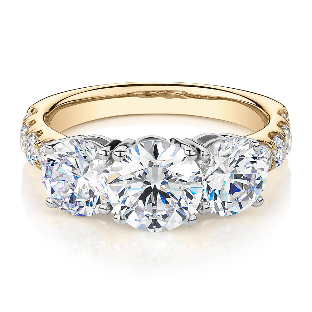 Three stone diamond store ring yellow gold