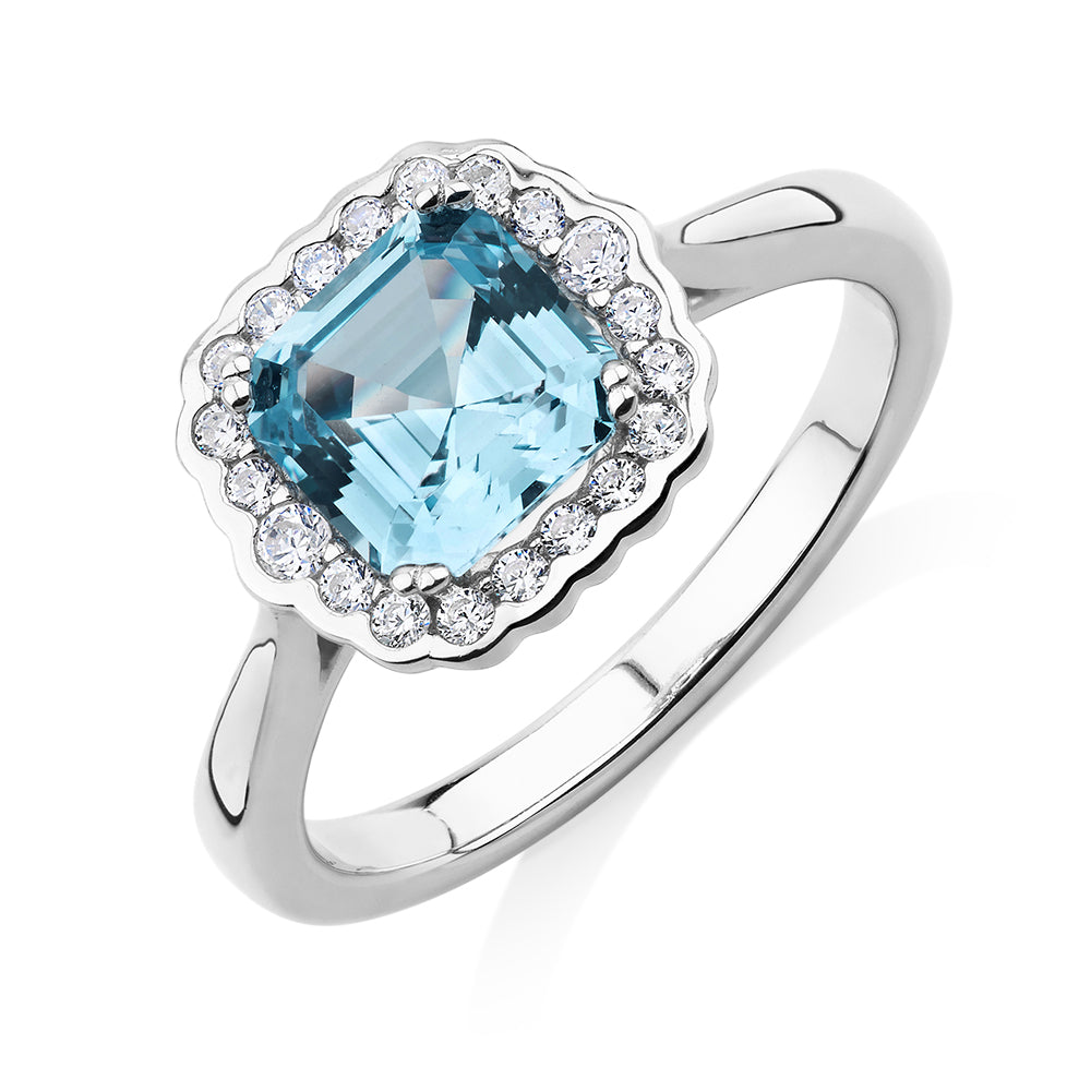 Dress ring with blue topaz simulant in sterling silver