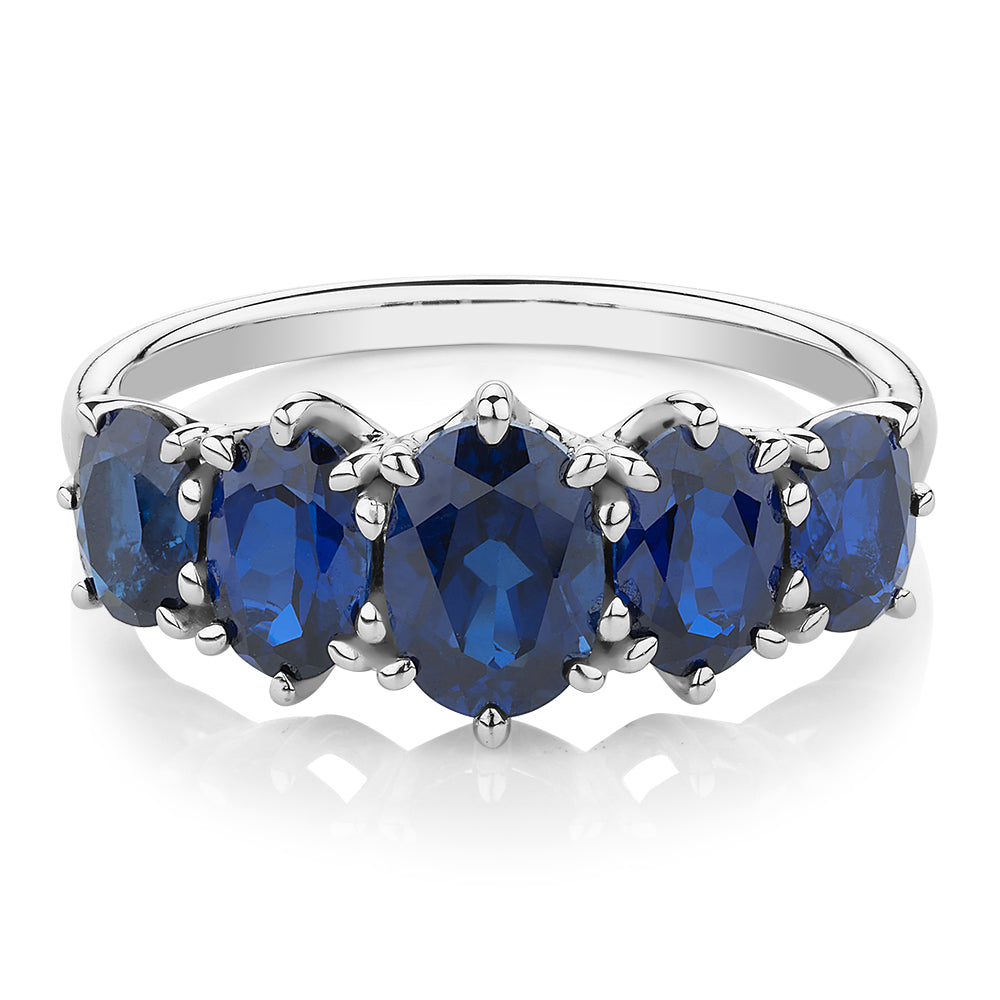 Dress ring with sapphire simulants in 10 carat white gold