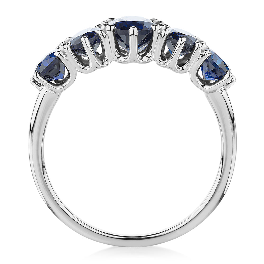 Dress ring with sapphire simulants in 10 carat white gold