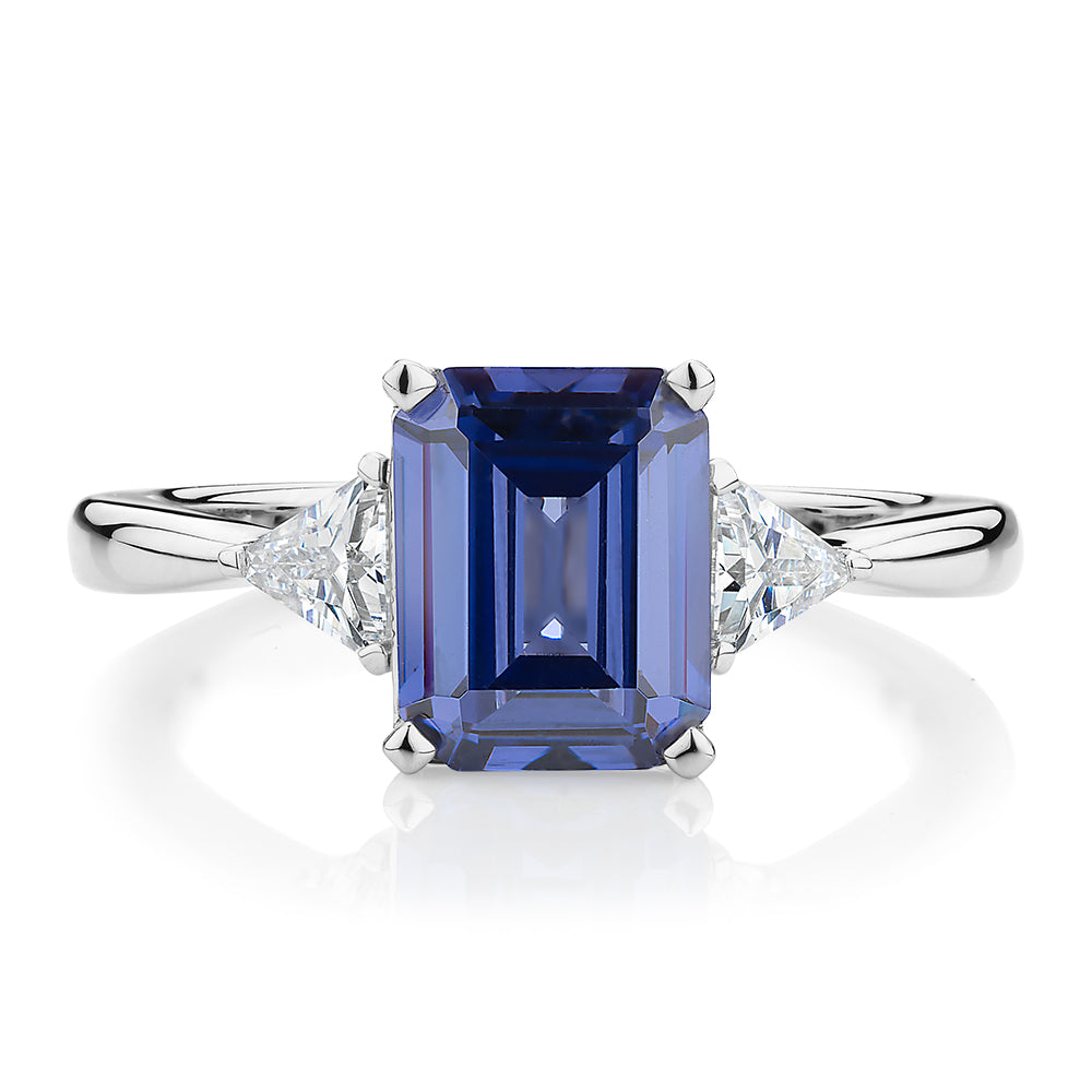 Dress ring with tanzanite simulant and 0.32 carats* of diamond simulants in sterling silver