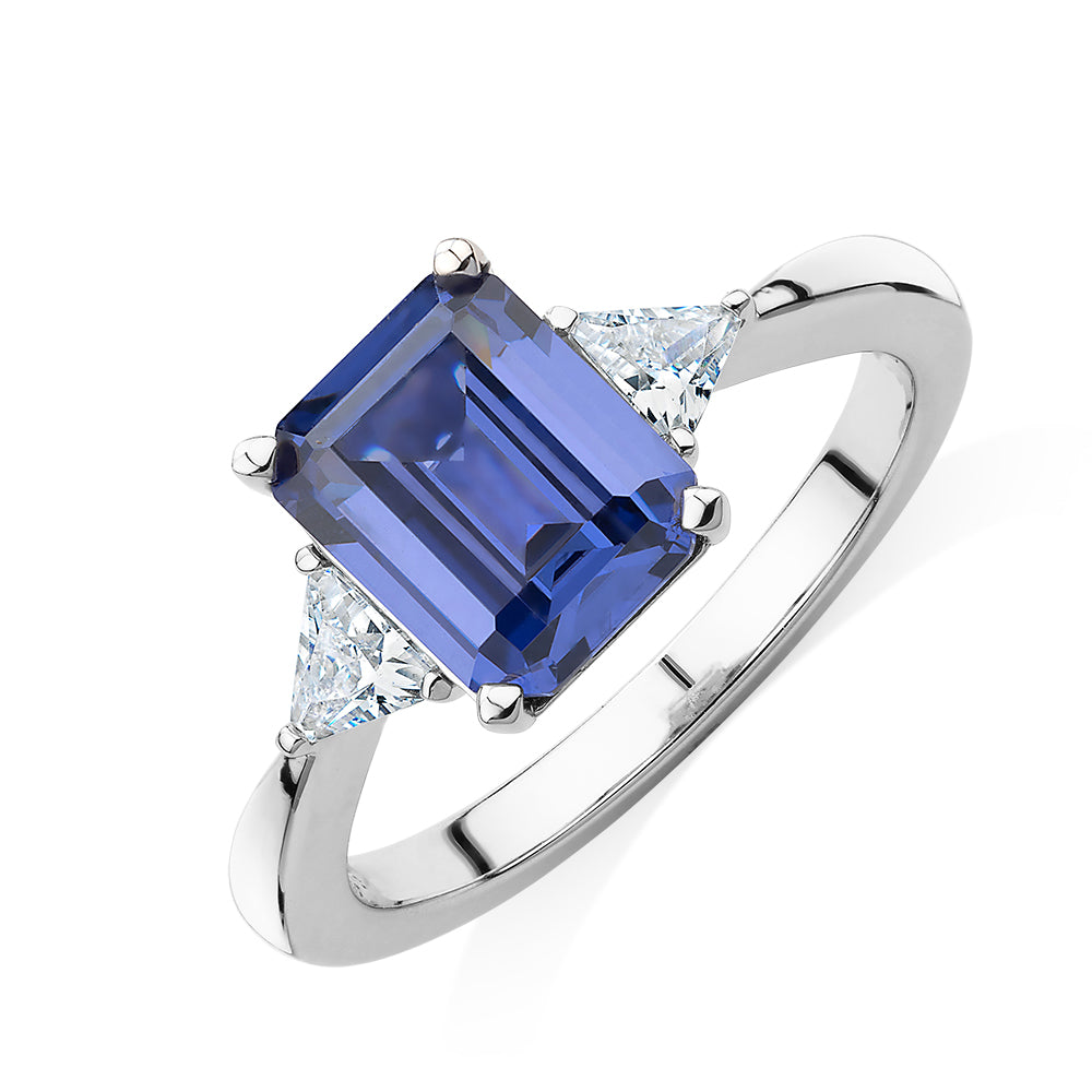 Dress ring with tanzanite simulant and 0.32 carats* of diamond simulants in sterling silver