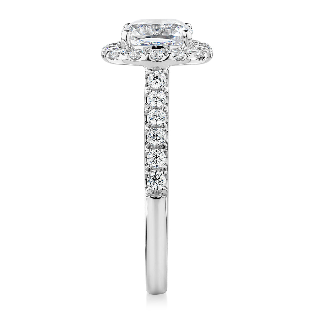 Cushion and Round Brilliant halo engagement ring with 1.65 carats* of diamond simulants in 14 carat white gold