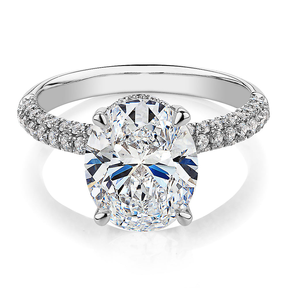 Oval and Round Brilliant shouldered engagement ring with 4.35 carats* of diamond simulants in 10 carat white gold