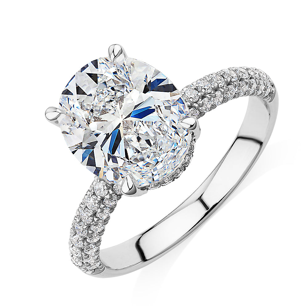 Oval and Round Brilliant shouldered engagement ring with 4.35 carats* of diamond simulants in 10 carat white gold