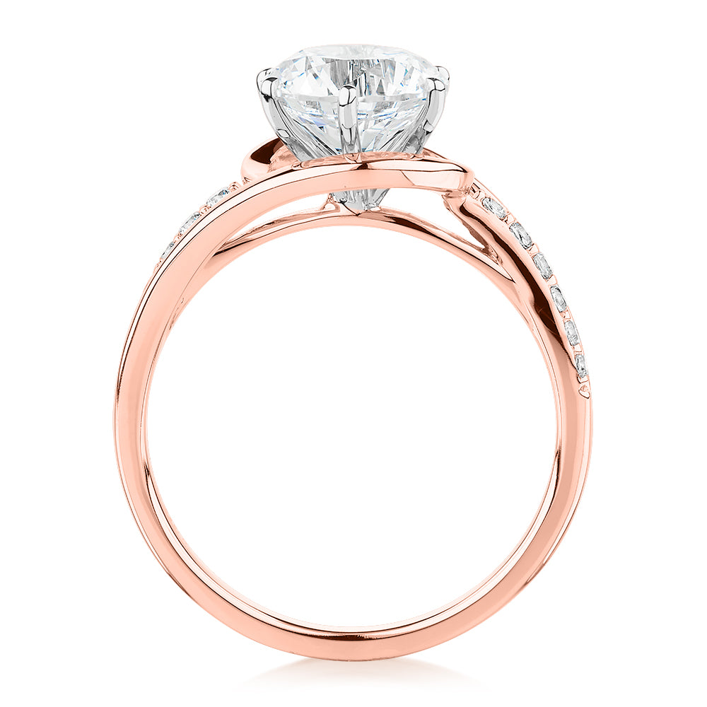 Round Brilliant shouldered engagement ring with 2.18 carats* of diamond simulants in 14 carat rose and white gold
