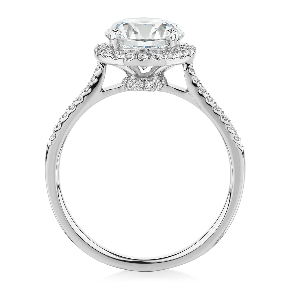 Round Brilliant halo engagement ring with 2.27 carats* of diamond simulants in 14 carat white gold