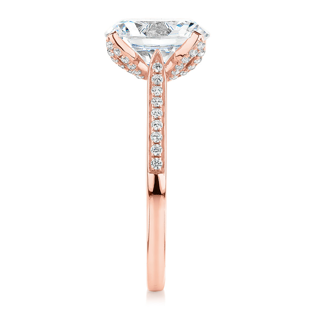 Oval and Round Brilliant shouldered engagement ring with 2.83 carats* of diamond simulants in 14 carat rose gold