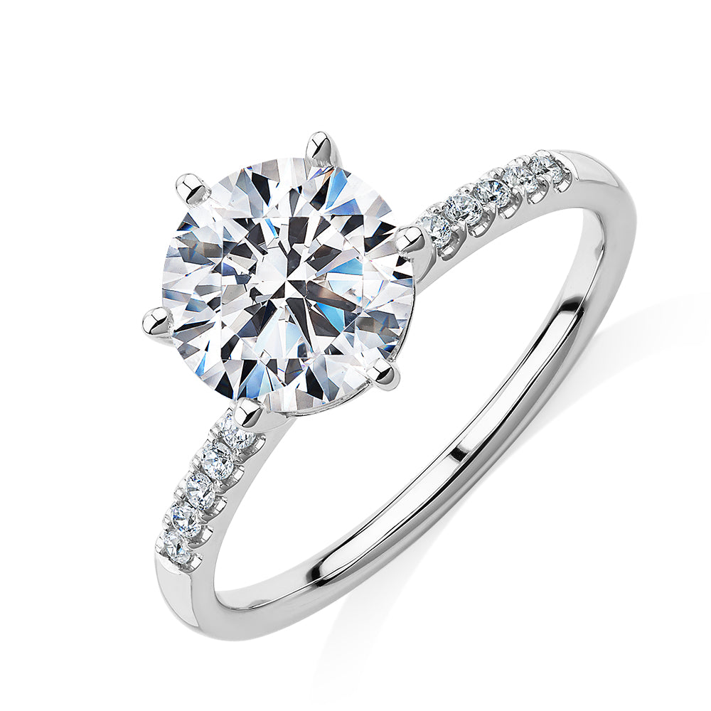 Round Brilliant shouldered engagement ring with 2.12 carats* of diamond simulants in 14 carat white gold