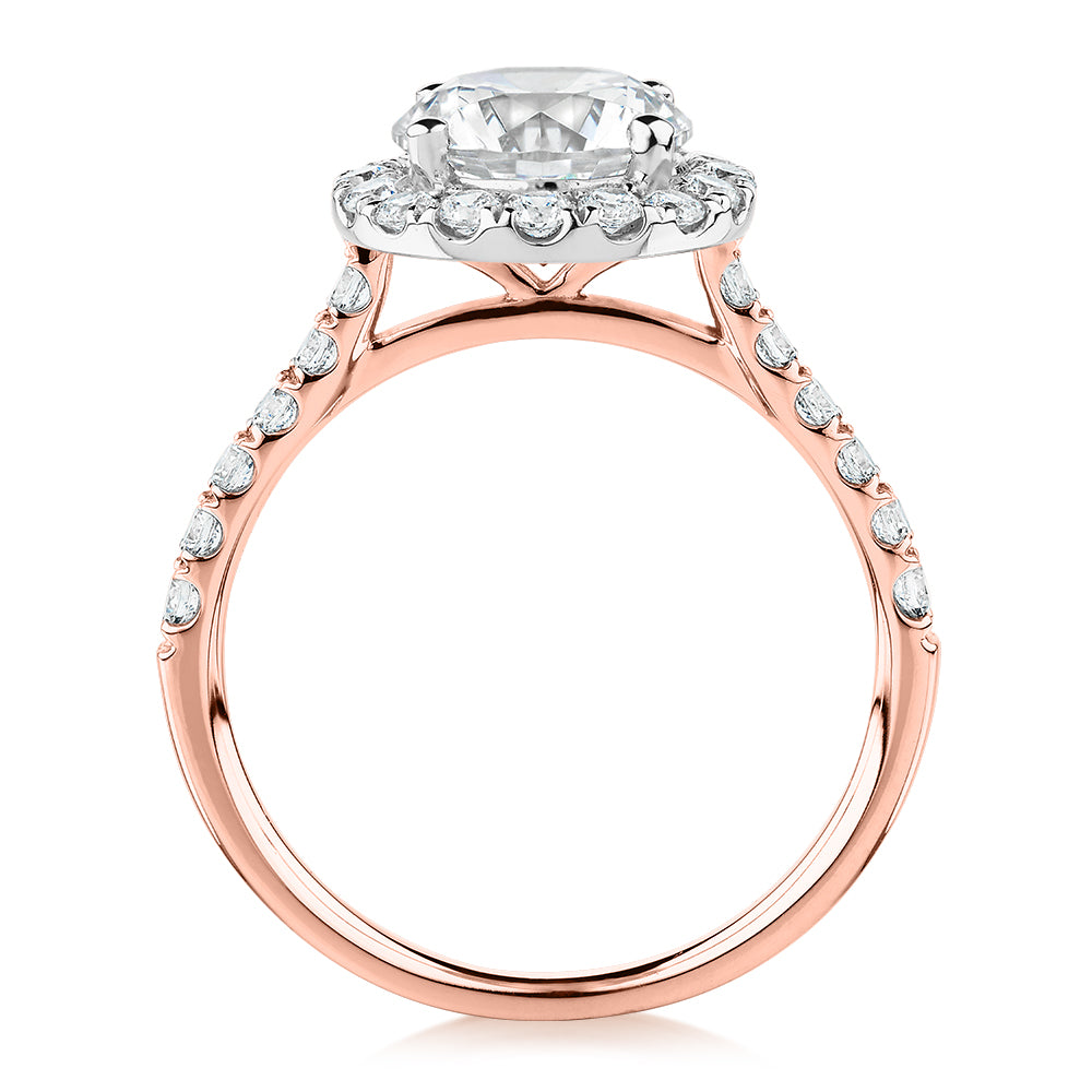 Round Brilliant halo engagement ring with 2.46 carats* of diamond simulants in 10 carat rose and white gold