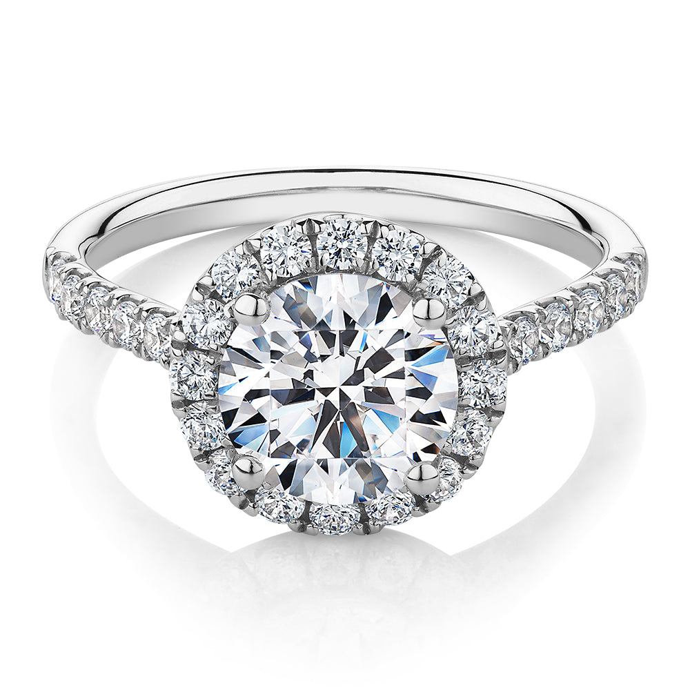 Round Brilliant halo engagement ring with 2.46 carats* of diamond simulants in 10 carat white gold