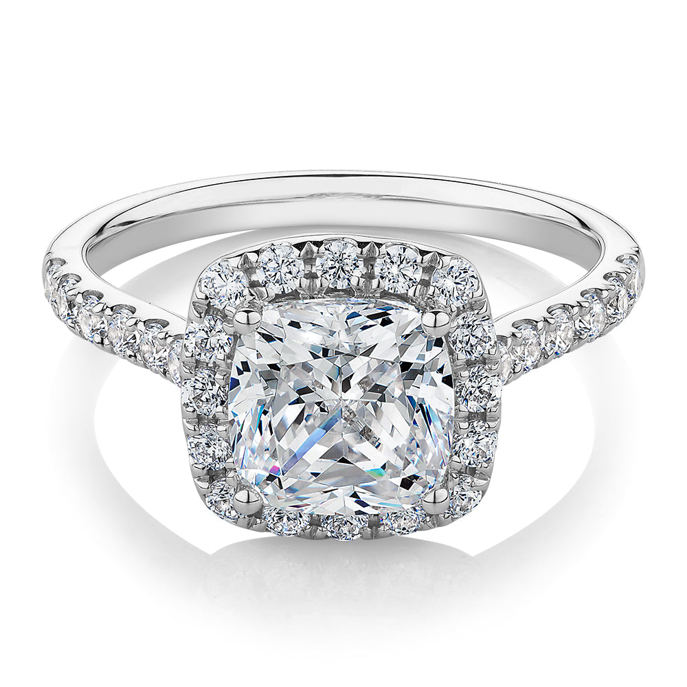 Cushion and Round Brilliant halo engagement ring with 2.09 carats* of diamond simulants in 10 carat white gold