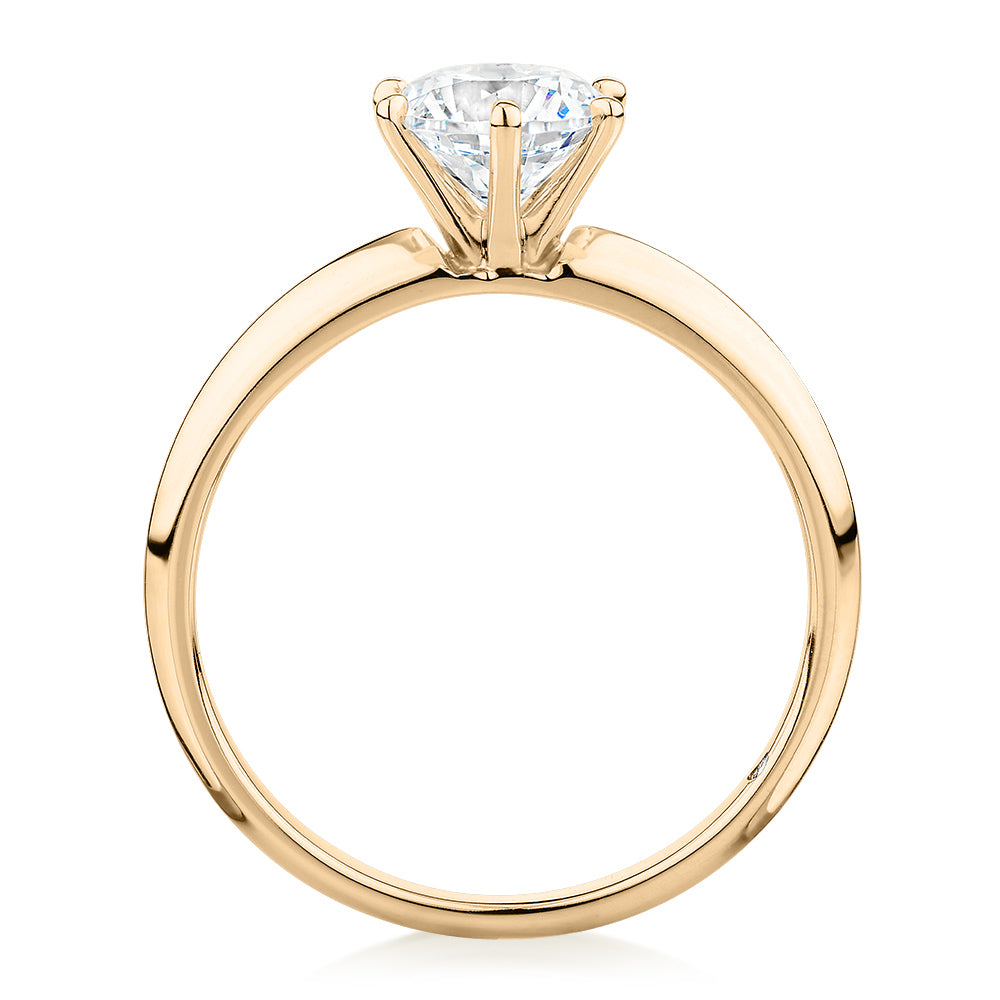 Round Brilliant solitaire engagement ring with 1 carat* diamond simulant in 14 carat yellow gold