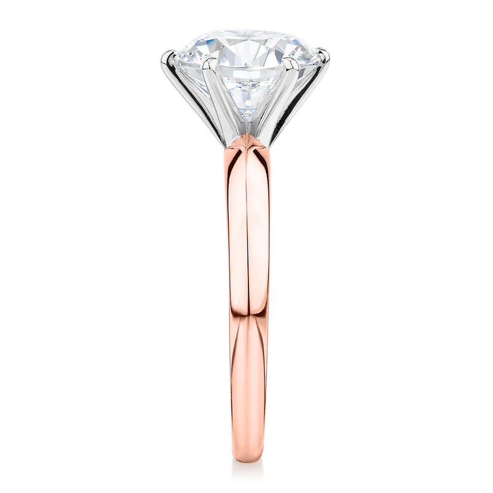 Round Brilliant solitaire engagement ring with 3 carat* diamond simulant in 14 carat rose and white gold