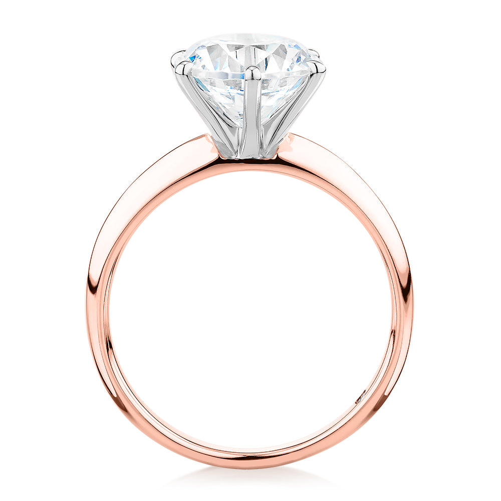 Round Brilliant solitaire engagement ring with 3 carat* diamond simulant in 14 carat rose and white gold