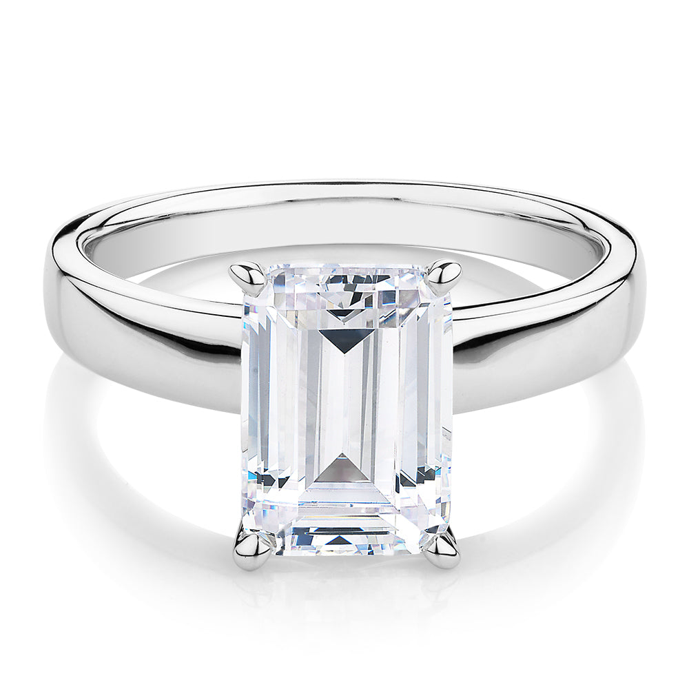 Emerald Cut solitaire engagement ring with 3.01 carat* diamond simulant in 14 carat white gold