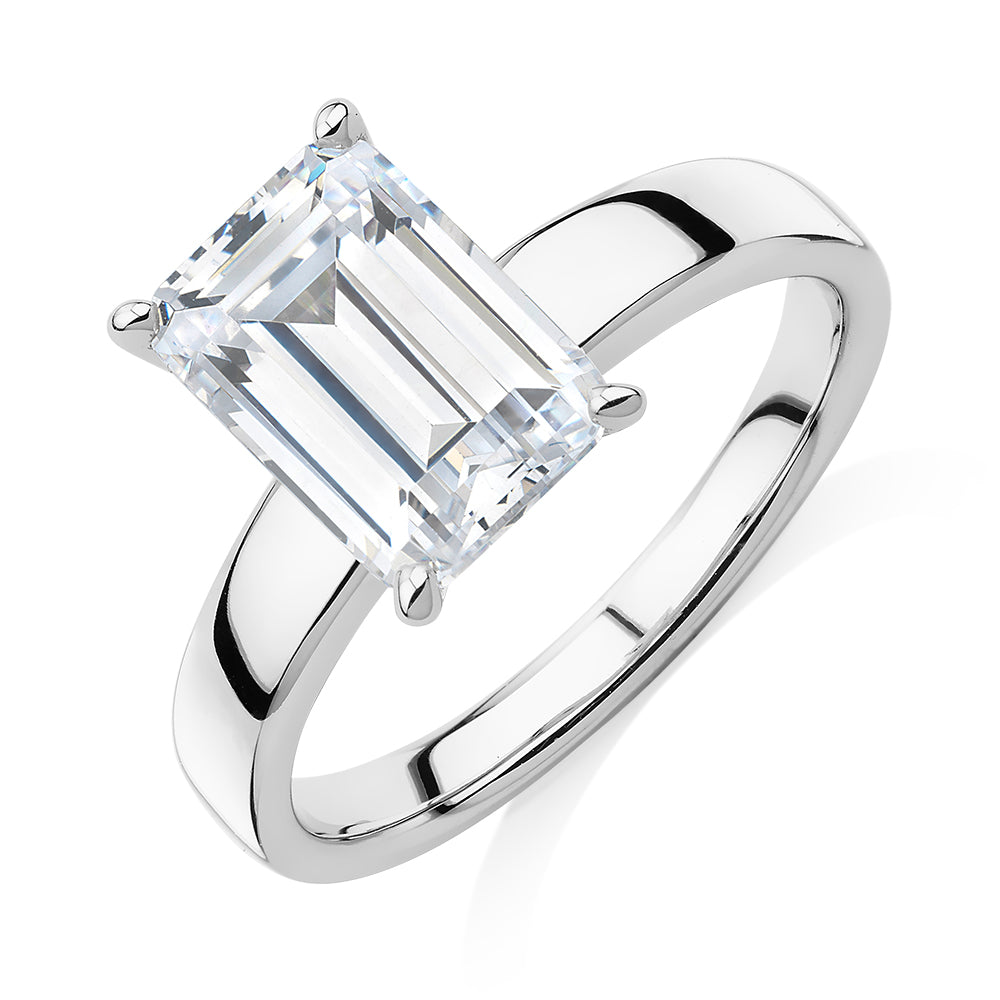 Emerald Cut solitaire engagement ring with 3.01 carat* diamond simulant in 14 carat white gold