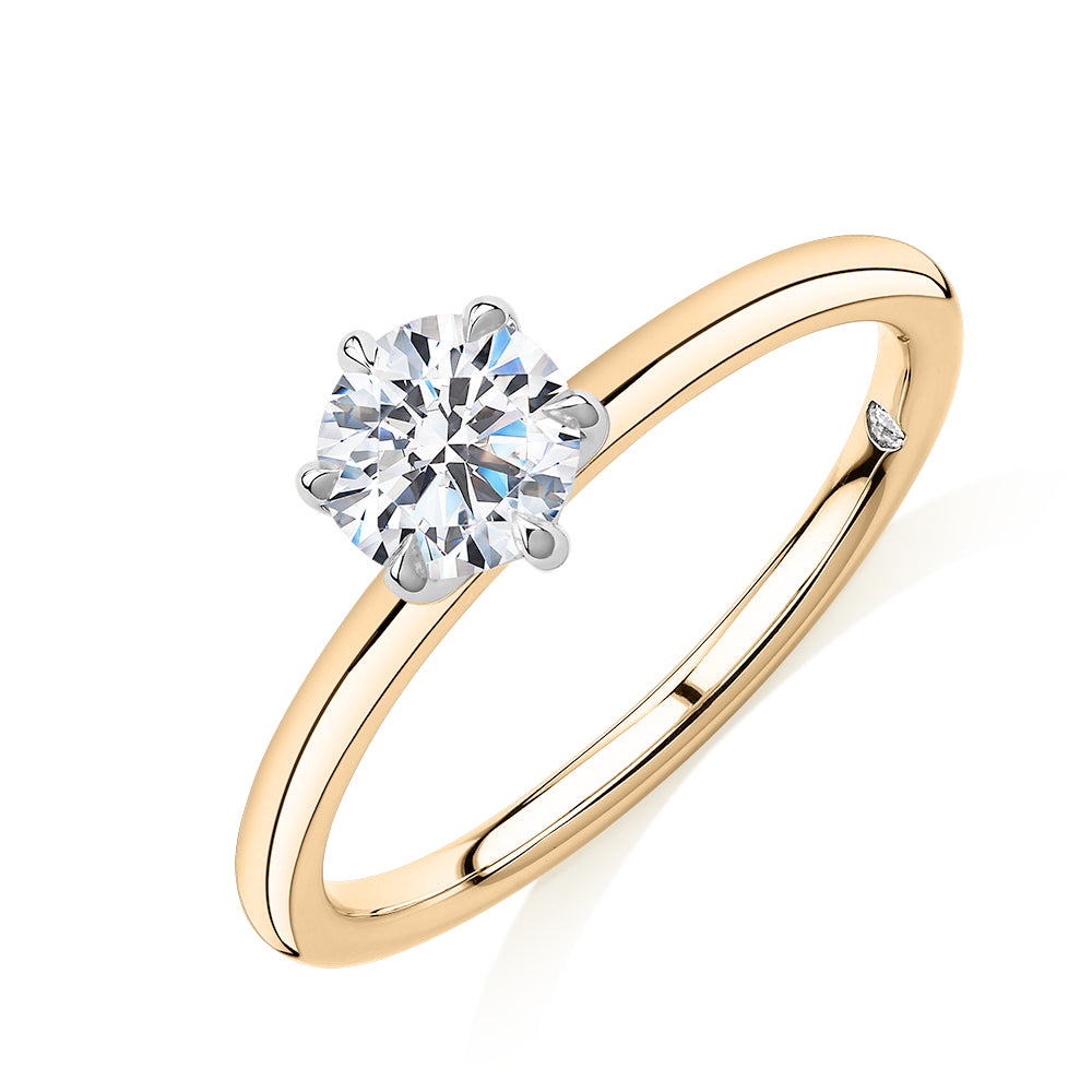 Signature Simulant Diamond 0.70 carat* round brilliant solitaire engagement ring in 14 carat yellow and white gold