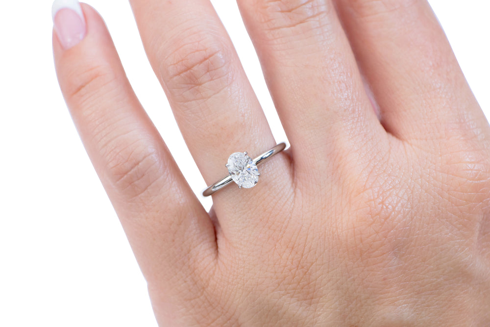 Signature Simulant Diamond 1.00 carat* oval solitaire engagement ring in 14 carat white gold