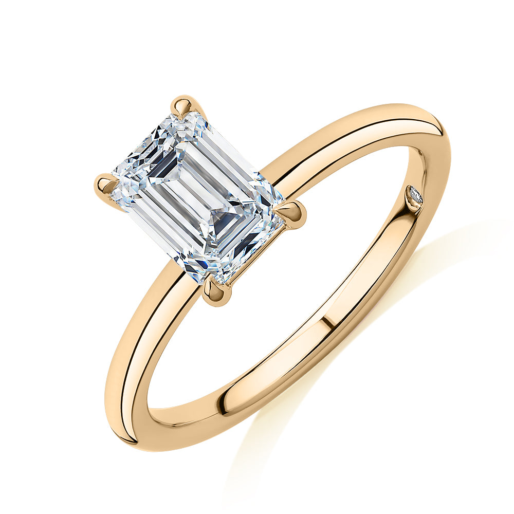 Signature Simulant Diamond 1.50 carat* emerald cut solitaire engagement ring in 14 carat yellow gold