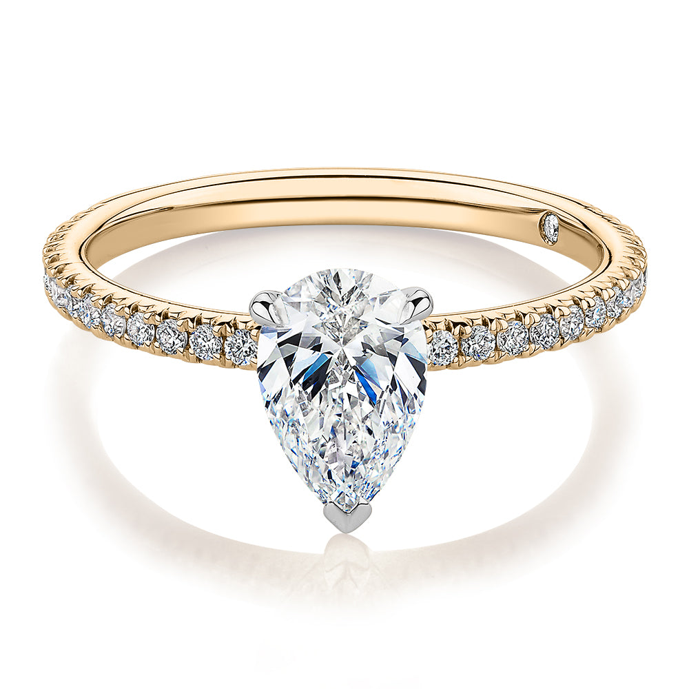 Signature Simulant Diamond 1.24 carat* TW pear and round brilliant shouldered engagement ring in 14 carat yellow and white gold