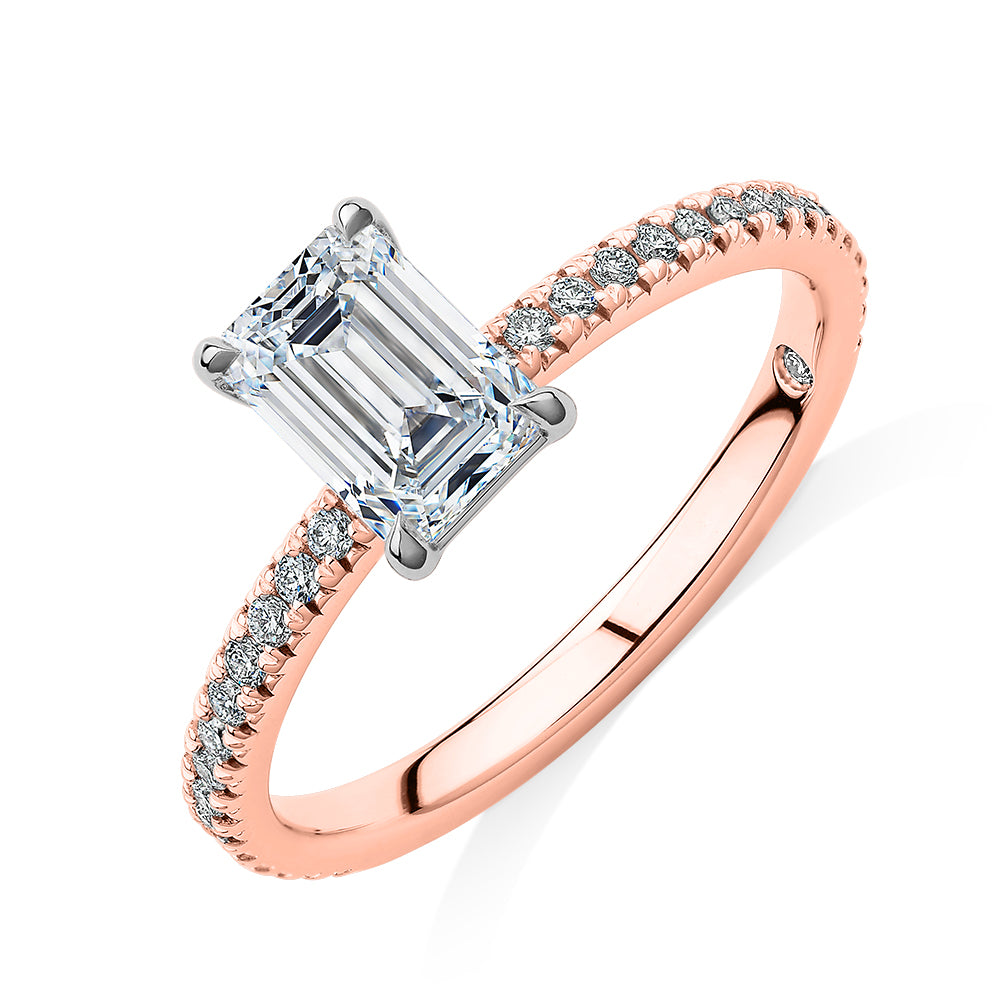 Signature Simulant Diamond 1.24 carat* TW emerald cut and round brilliant shouldered engagement ring in 14 carat rose and white gold