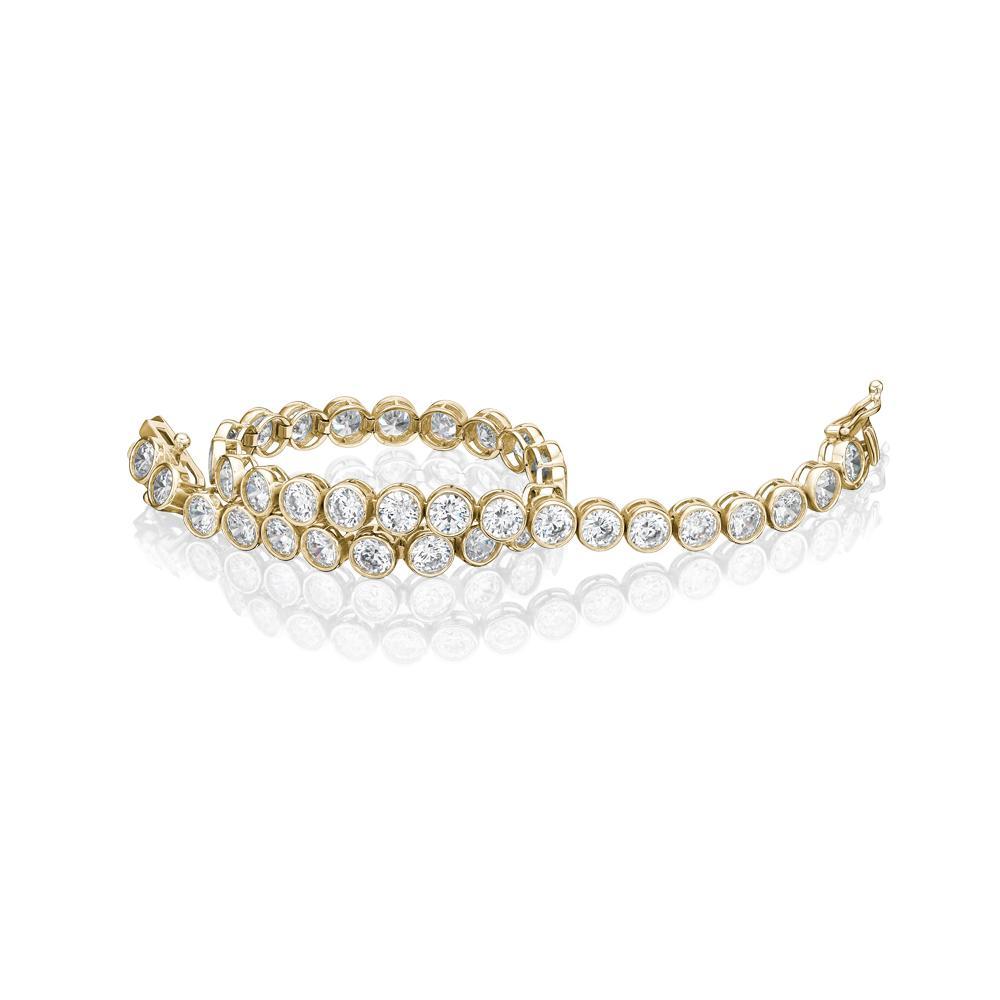 Round Brilliant tennis bracelet with 10.25 carats* of diamond simulants in 10 carat yellow gold