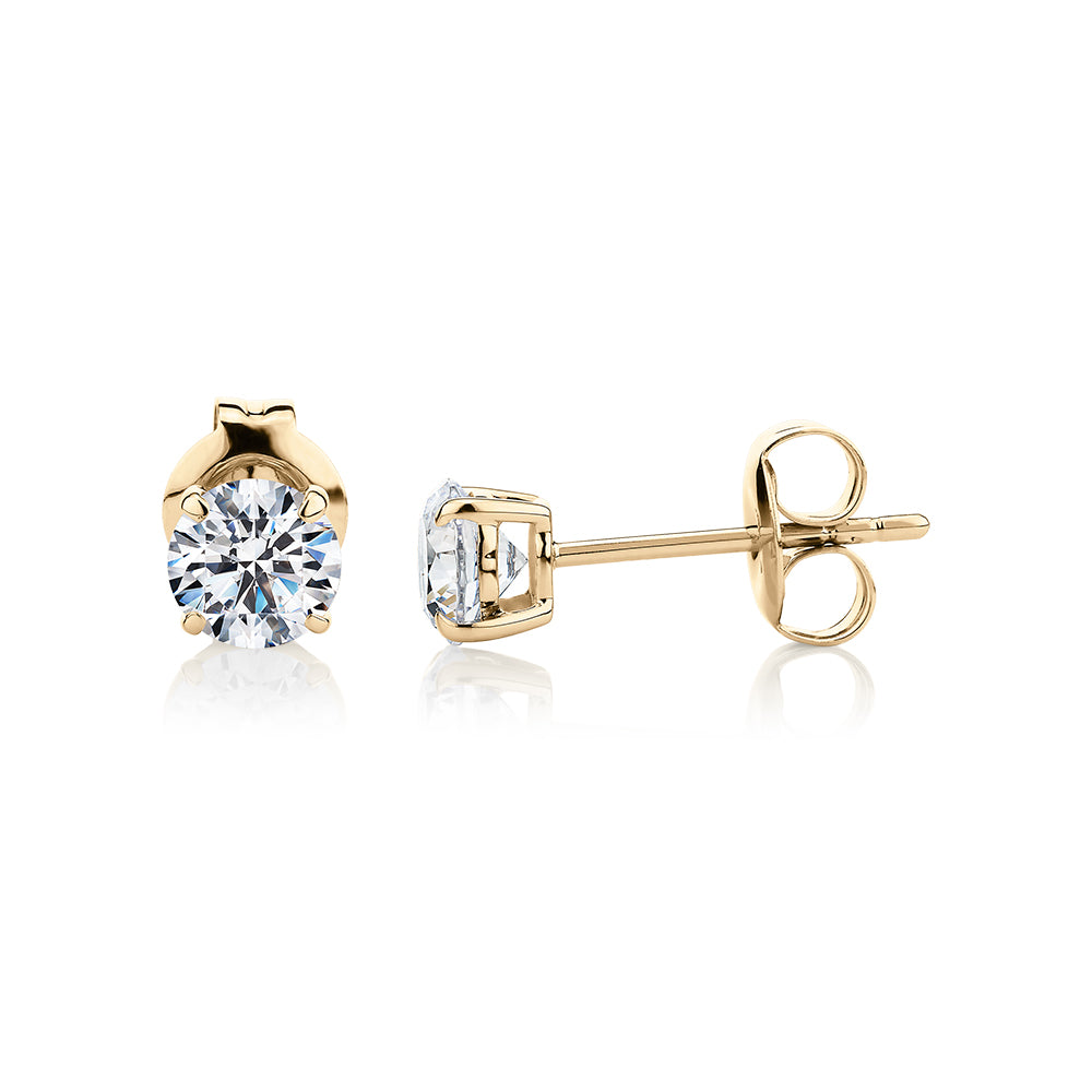 Round Brilliant stud earrings with 1 carat* of diamond simulants in 10 carat yellow gold