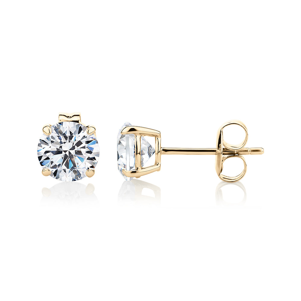 Round Brilliant stud earrings with 2 carats* of diamond simulants in 10 carat yellow gold