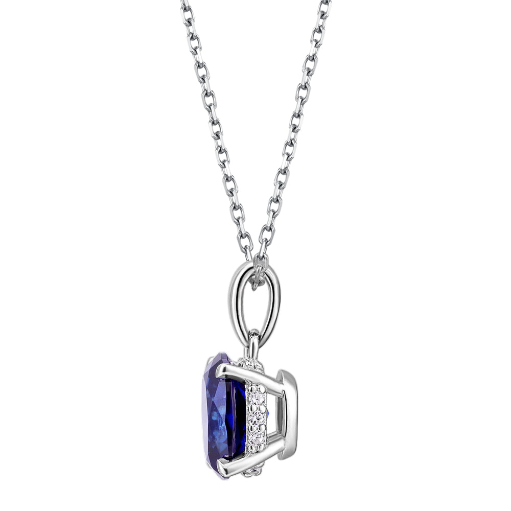 Round Brilliant solitaire necklace with dark blue sapphire simulant in sterling silver