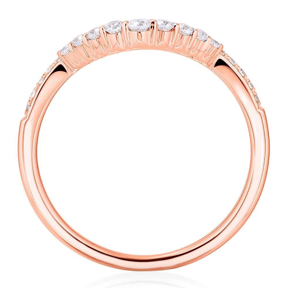 Round Brilliant curved wedding or eternity band in 10 carat rose gold