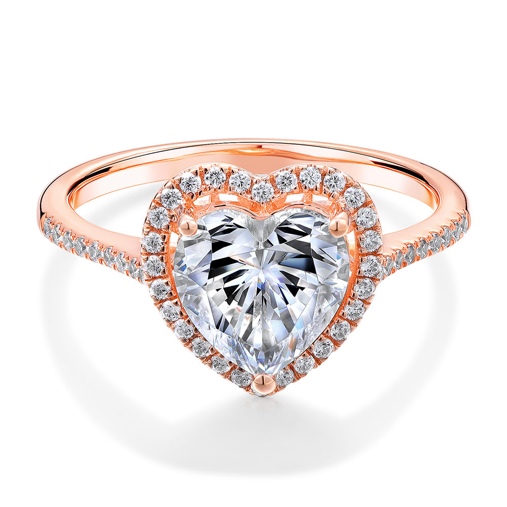 Heart and Round Brilliant halo engagement ring with 1.94 carats* of diamond simulants in 14 carat rose gold