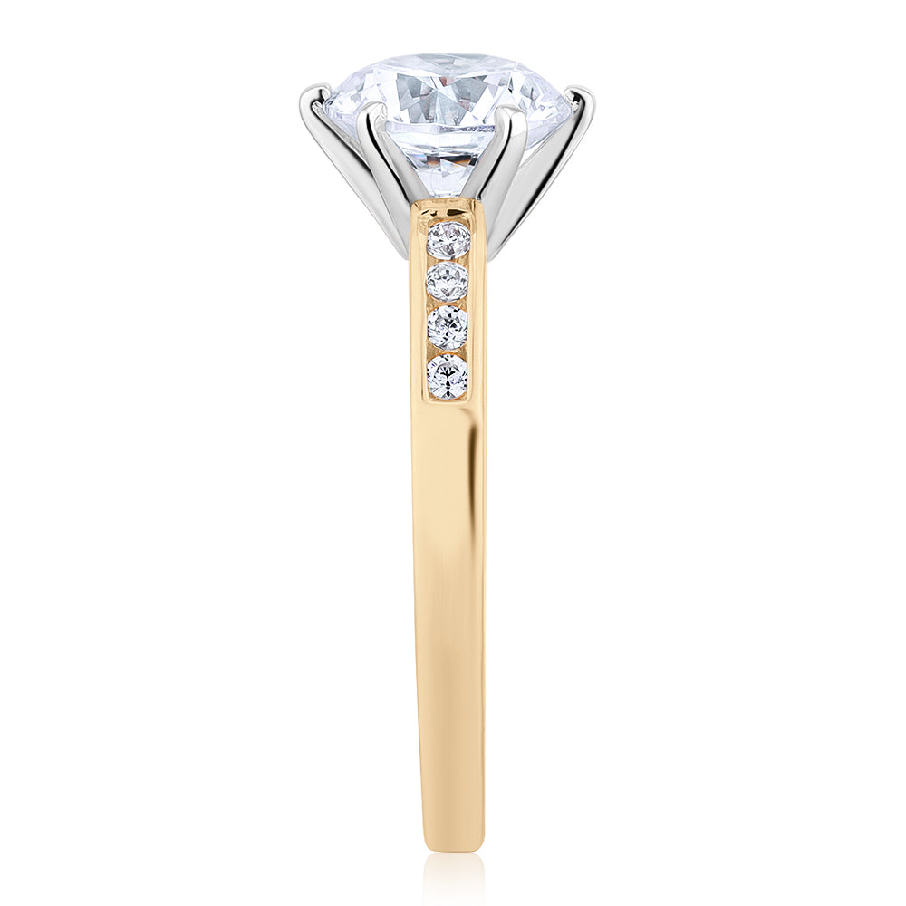 Round Brilliant shouldered engagement ring with 2.16 carats* of diamond simulants in 14 carat yellow and white gold