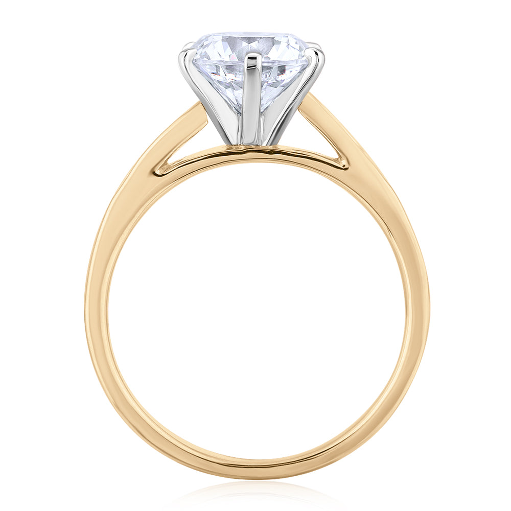 Round Brilliant shouldered engagement ring with 2.16 carats* of diamond simulants in 14 carat yellow and white gold