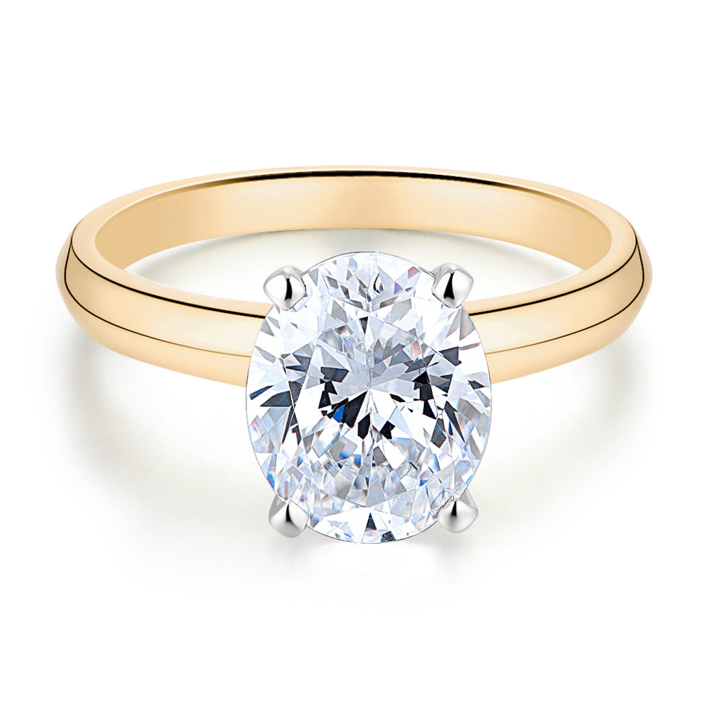 Oval solitaire engagement ring with 2.54 carat* diamond simulant in 14 carat yellow and white gold