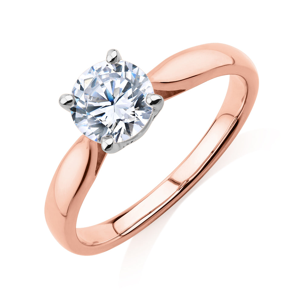 Round Brilliant solitaire engagement ring with 1 carat* diamond simulant in 14 carat rose and white gold